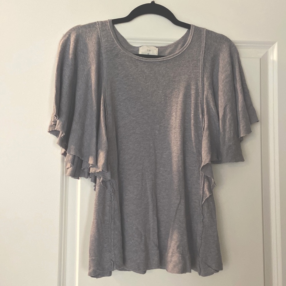 Distressed yet delicate short-sleeve top
